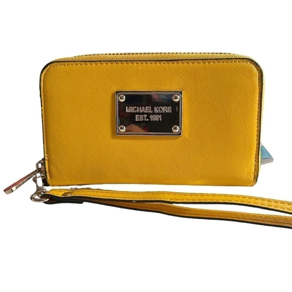 Michael Kors Jet Set Wristlet Wallet in vibrant yellow Saffiano leather.